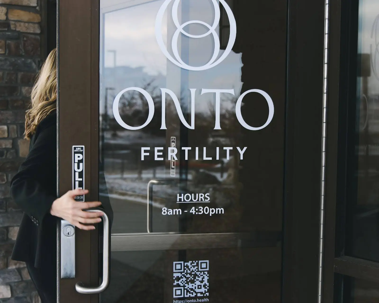 Onto Fertility Clinic Door